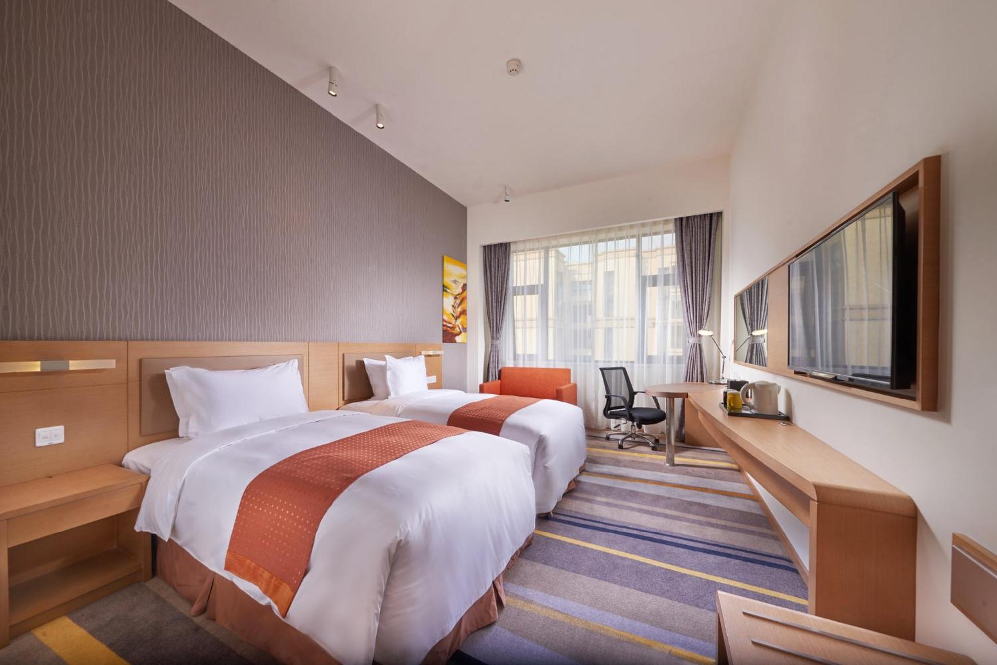 Holiday Inn Express Chengdu Huanhuaxi By Ihg-Near Jinsha Site Musem,Near Wuhou Temple Museum,Welcome Drinks,Free Gym,Free Self-Service Laundry تشنجدو المظهر الخارجي الصورة