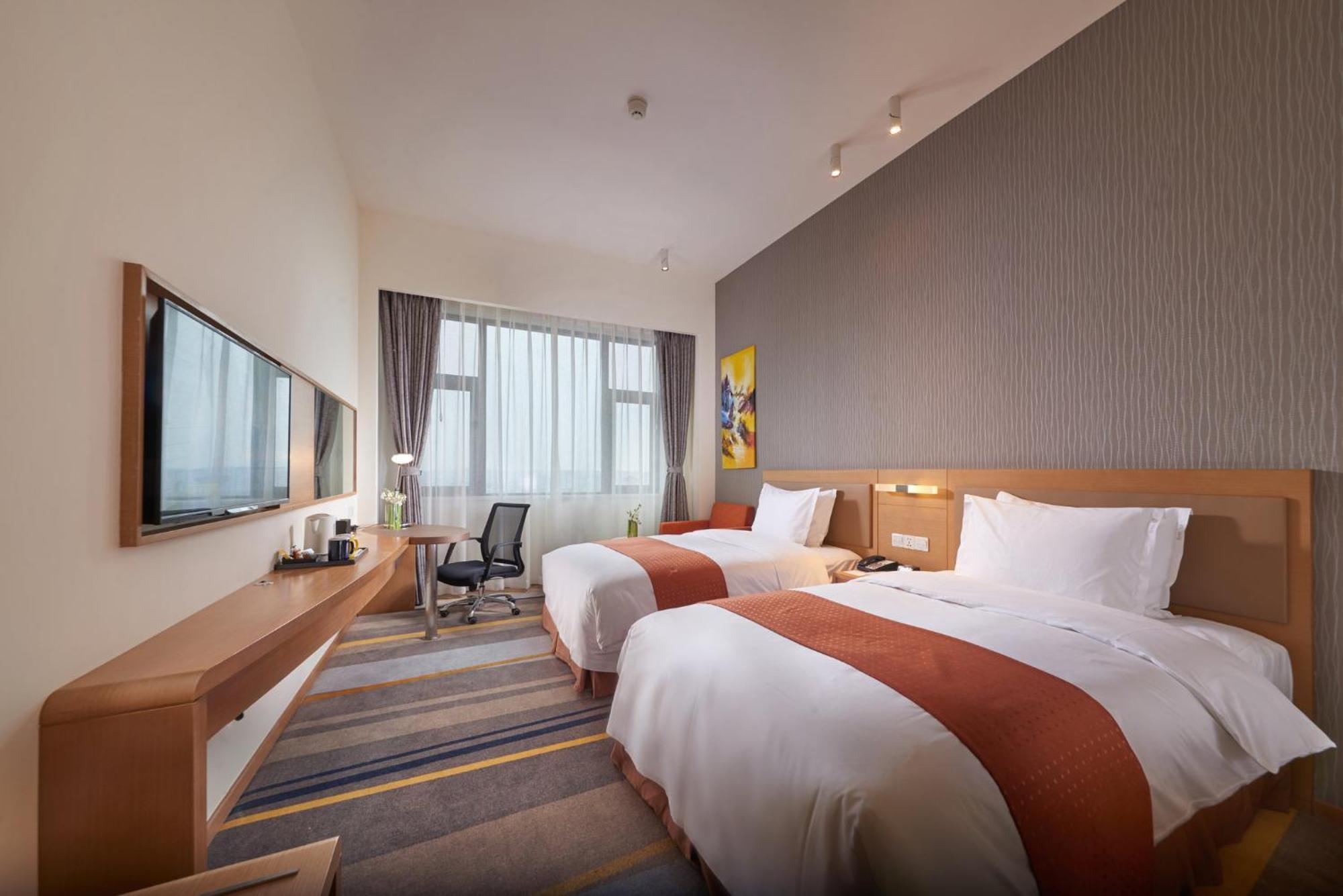Holiday Inn Express Chengdu Huanhuaxi By Ihg-Near Jinsha Site Musem,Near Wuhou Temple Museum,Welcome Drinks,Free Gym,Free Self-Service Laundry تشنجدو المظهر الخارجي الصورة